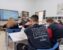 Students attentively learning in a classroom at the International School of Prishtina.